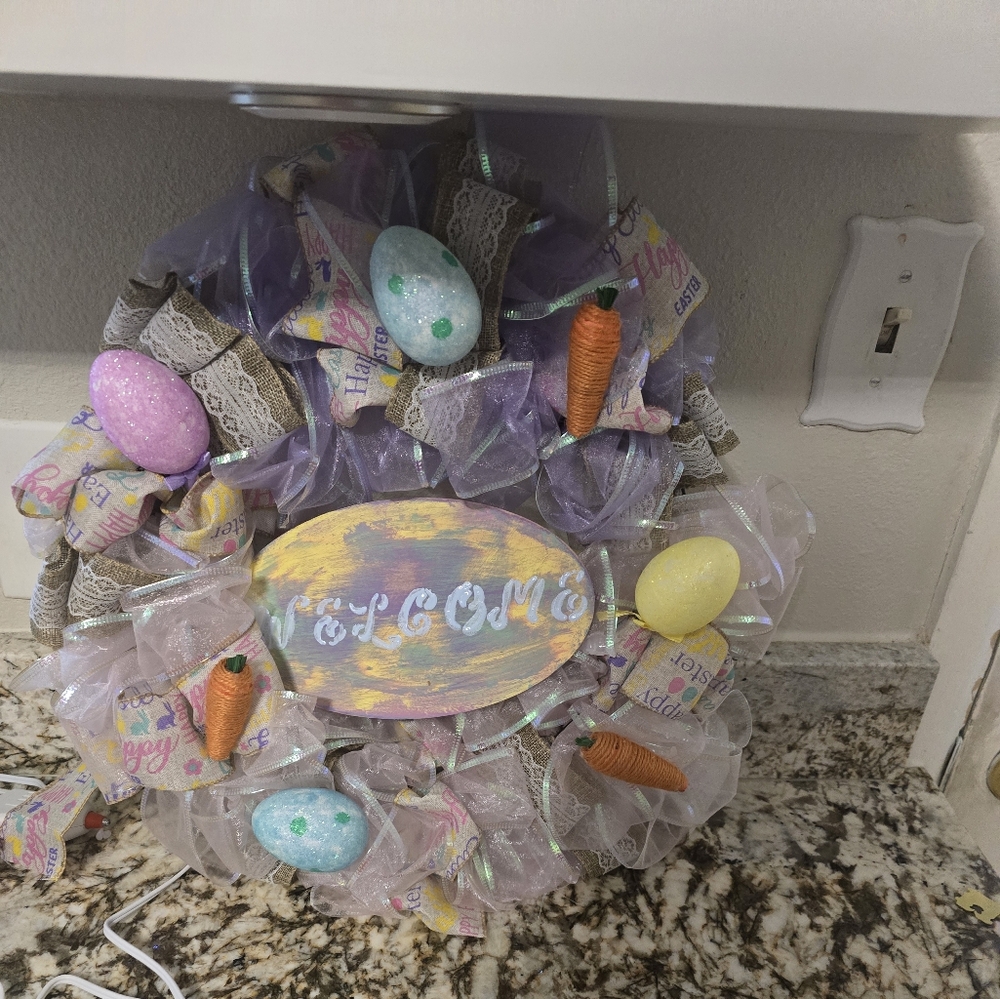 Handmaid easter wreath with welcome sign.